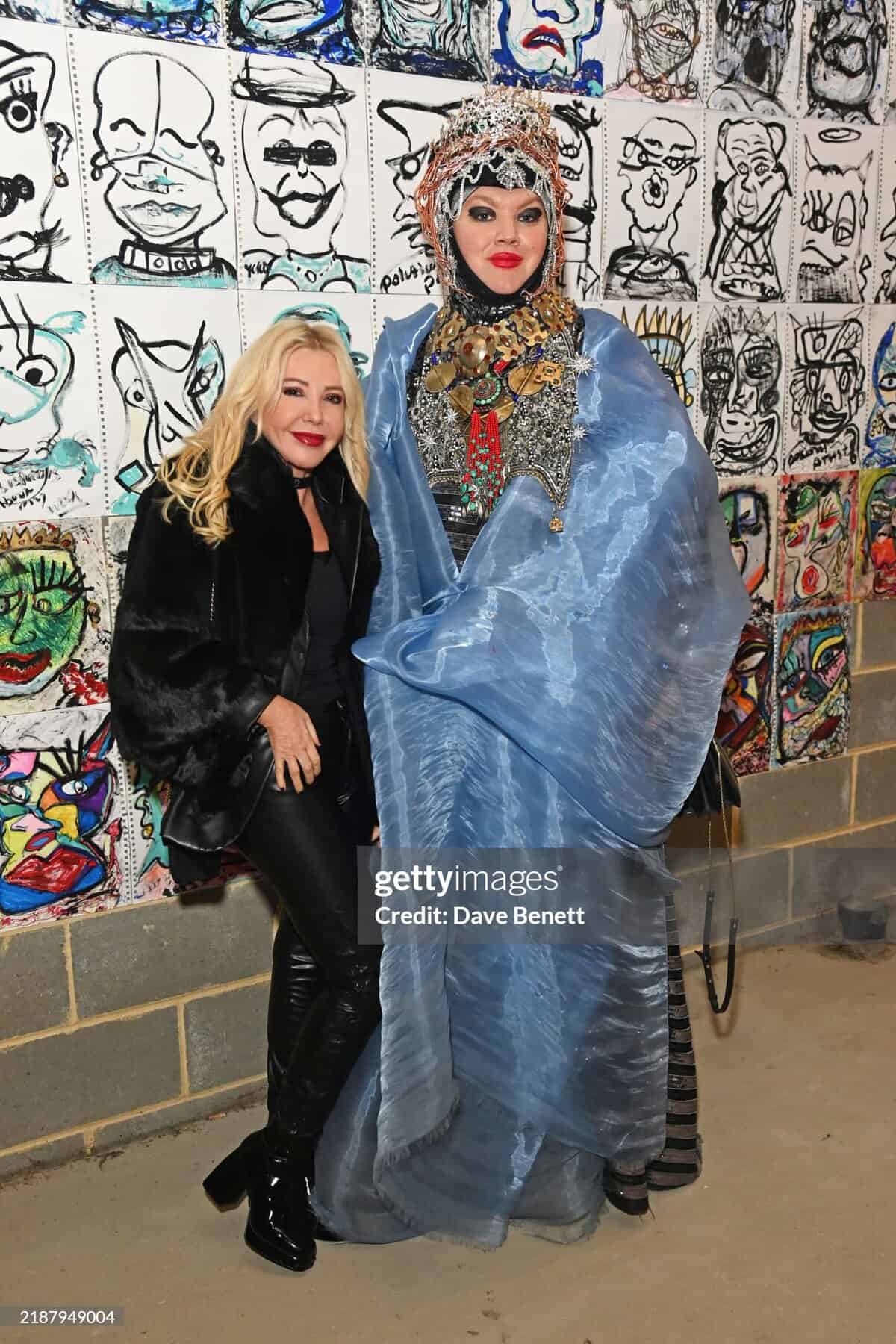 Monika Bacardi with Daniel Lismore during his first solo painting Mind on the Walls in London