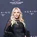 Lady Monika Bacardi attending the Kering Women in Motion Awards at Cannes 2026, wearing an elegant black dress with feathered sleeves.