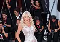 Lady Monika Bacardi in an elegant gown on the red carpet at the 83rd Venice International Film Festival.